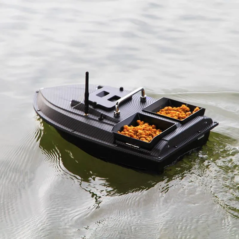 Manuowell D007 bait boat on the water carrying bait in both hoppers